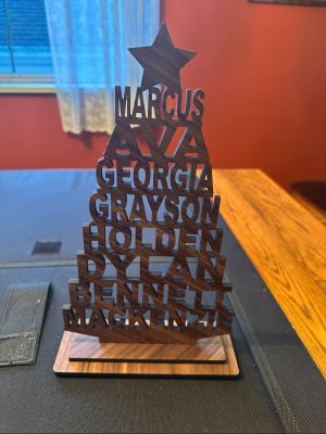 latest   laser   named xmas tree stand  mackenzie 