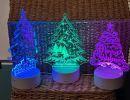 latest   round base   xmas trees  assorted 