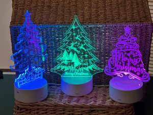 latest   round base   xmas trees  assorted 